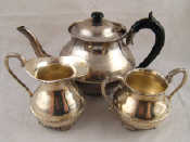 Appraisal: A three piece tea set marked silver wt g