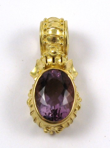 Appraisal: LARGE OVAL CUT AMETHYST PENDANT set in heavy K yellow