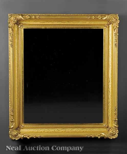 Appraisal: An American Carved Giltwood Looking Glass c deep molded frame