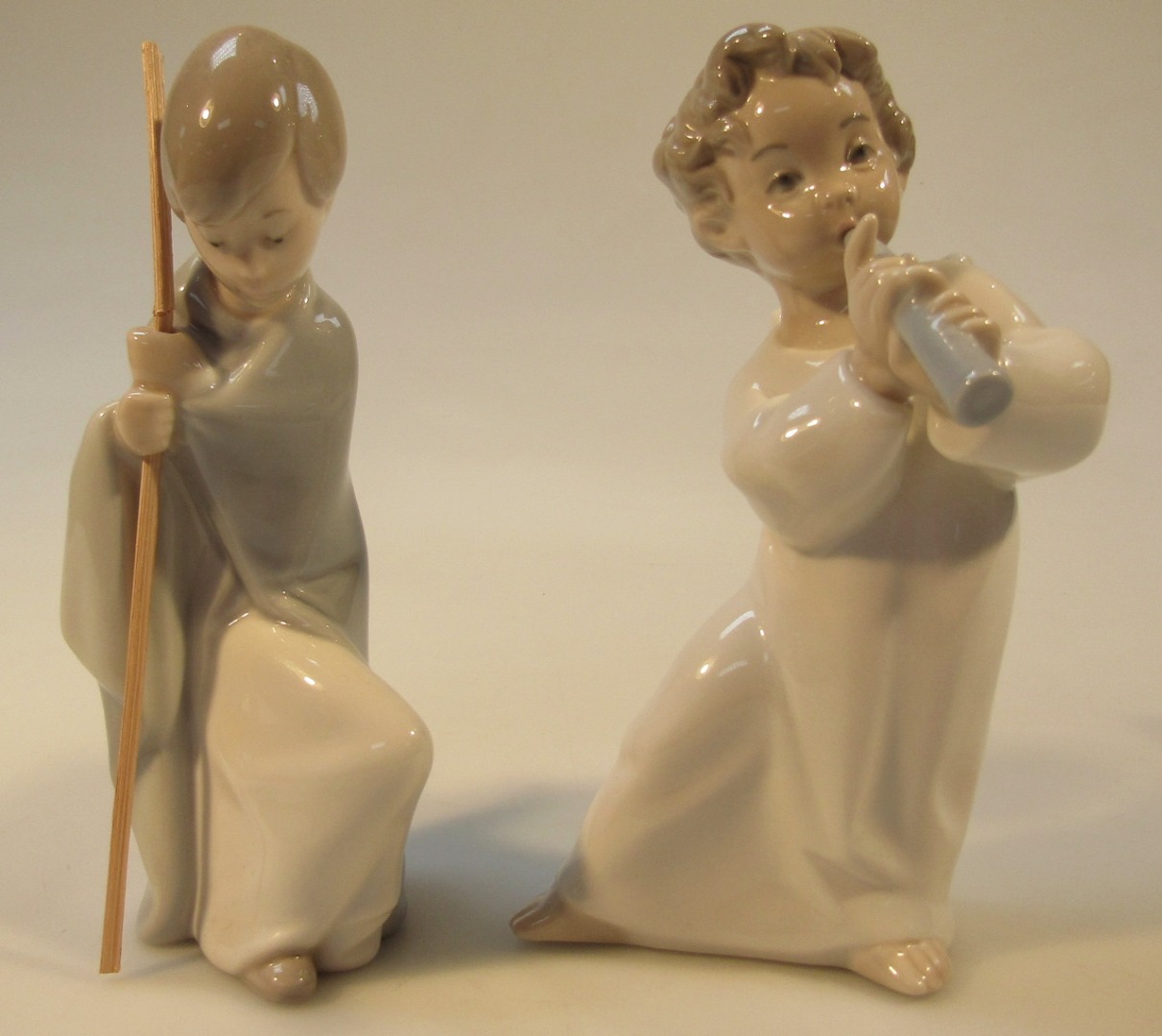 Appraisal: A thC Lladro figure of an angel playing a recorder