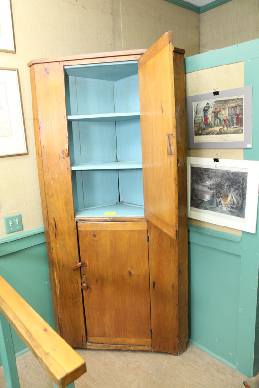 Appraisal: CORNER CUPBOARD One piece pine cupboard with two blind doors