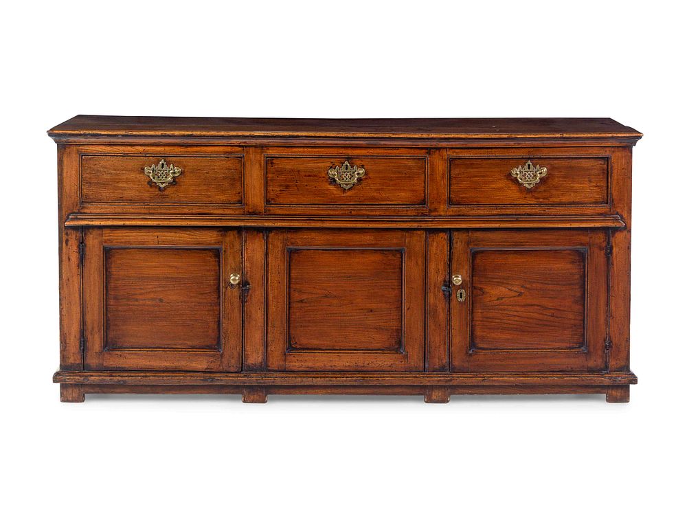 Appraisal: A George III Elm Sideboard Cabinet A George III Elm