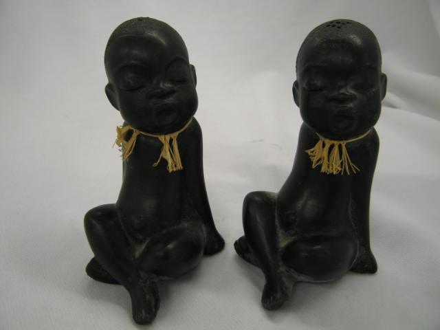 Appraisal: Pair of Goldschieder Austria Pottery Black child figural salt peppers