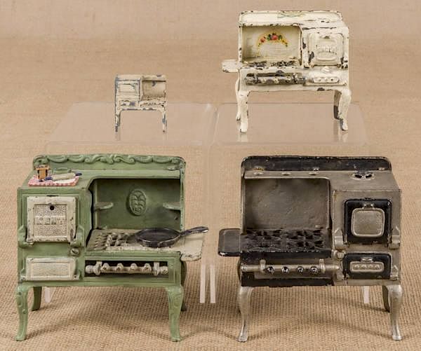 Appraisal: Three cast iron toy gas stoves to include a Kent