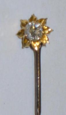 Appraisal: A DIAMOND STICK PIN the old brilliant cut stone approximately