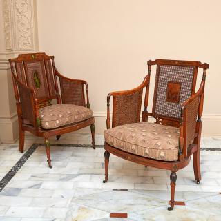 Appraisal: Nice pair Edwardian painted satinwood bergeres Nice pair Edwardian painted