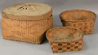 Appraisal: Three baskets to include one covered with handles and two