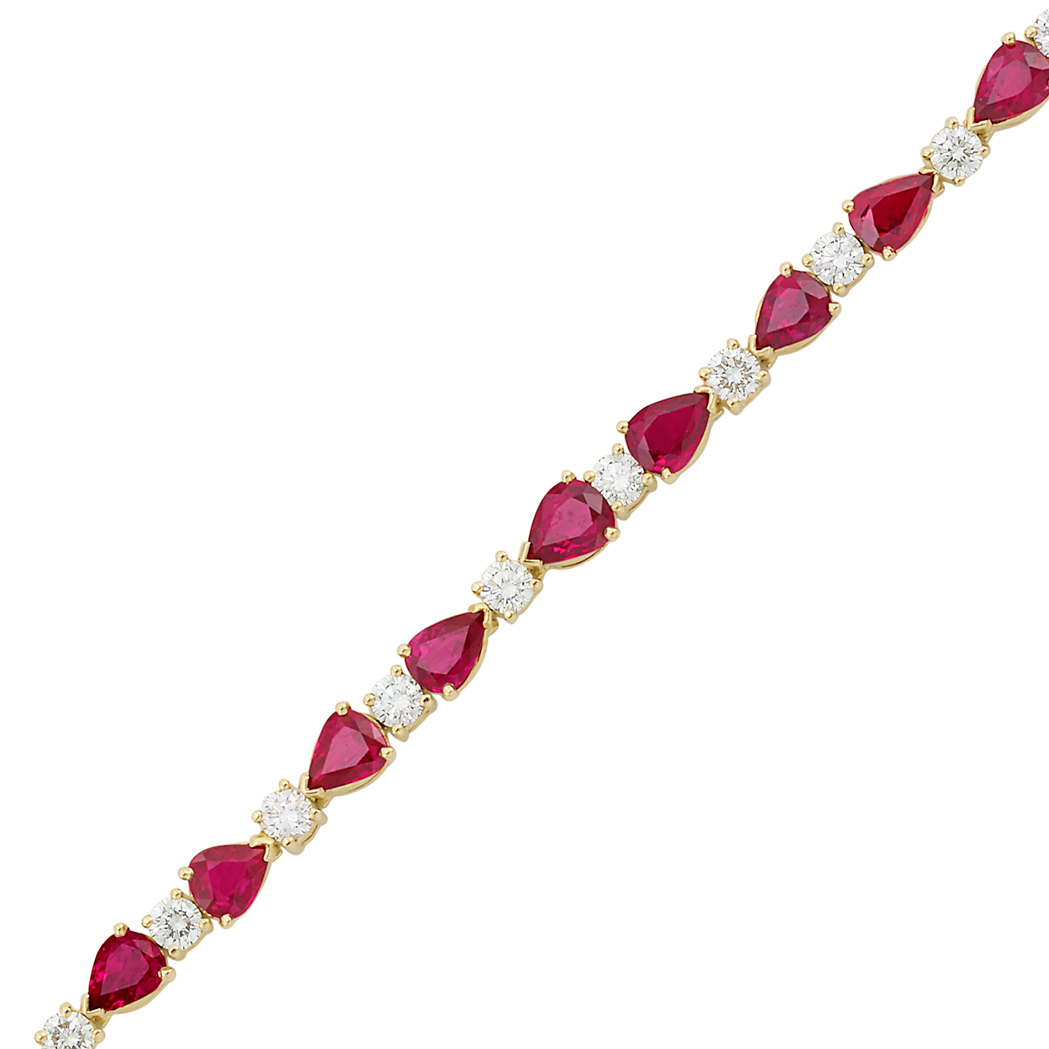 Appraisal: Gold Ruby and Diamond Bracelet round diamonds ap cts pear-shaped