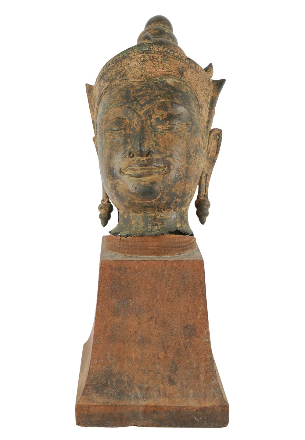 Appraisal: SOUTHEAST ASIAN CAST METAL HEADmounted on later added wooden pedestal