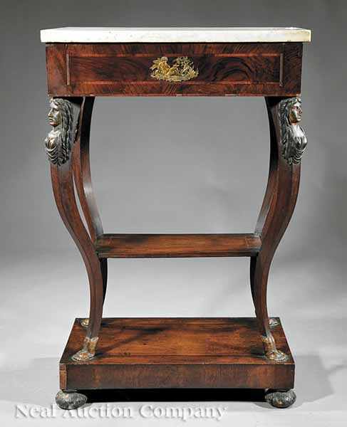 Appraisal: An Empire Carved Mahogany Inlaid and Bronze-Mounted Console Table early