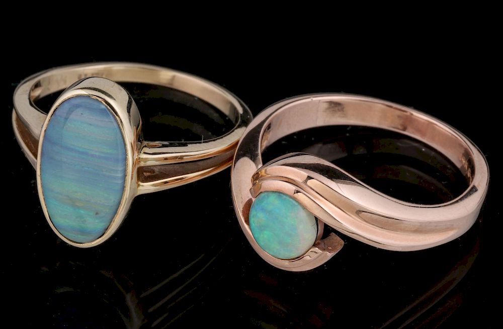 Appraisal: TWO LADIES' K GOLD AND OPAL FASHION RINGS Micky Roof