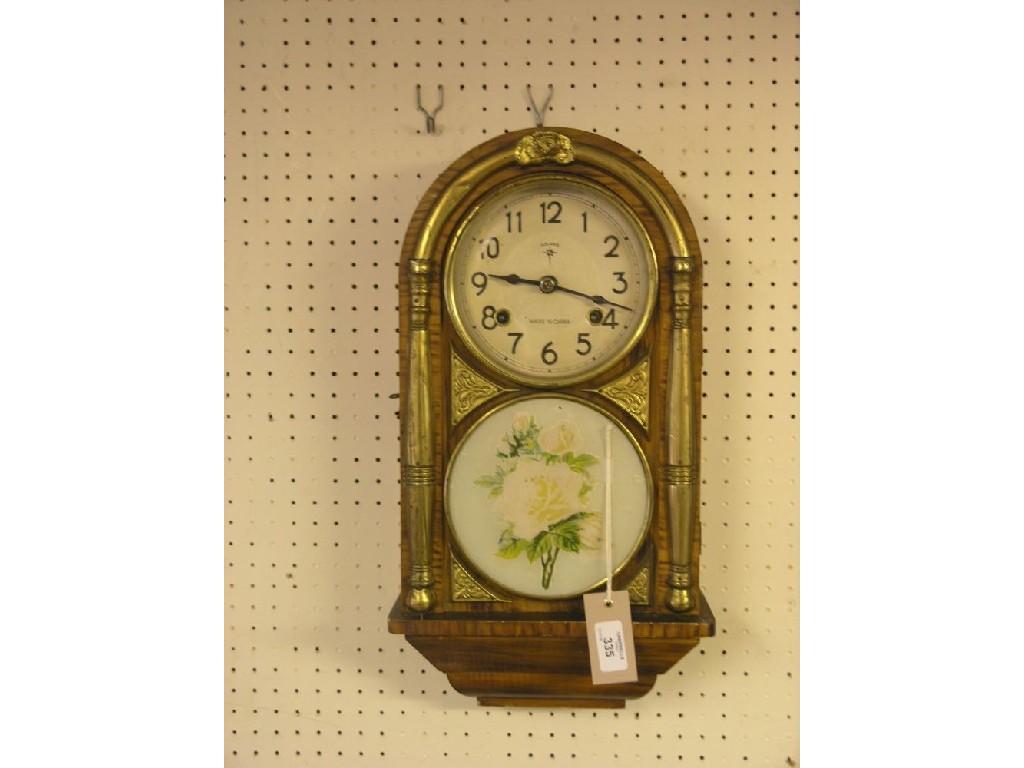 Appraisal: A Polaris wall clock with circular enamelled dial and -day