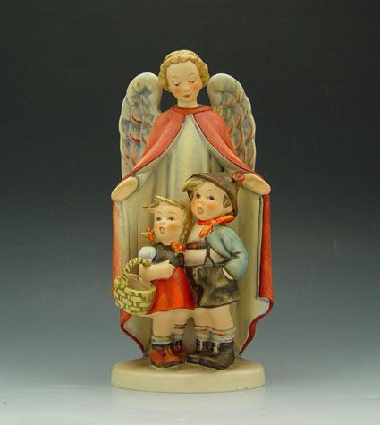 Appraisal: HUMMEL ANGEL FIGURAL GROUP ''HEAVENLY PROTECTION'' Small stylized bee mark