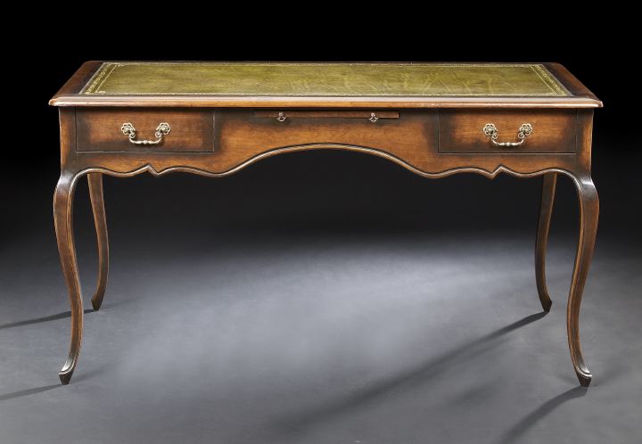 Appraisal: Provincial Louis XV-Style Fruitwood Writing Table the rounded rectangular top