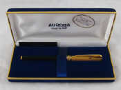 Appraisal: A boxed Aurora fountain pen with silver gilt cap marked