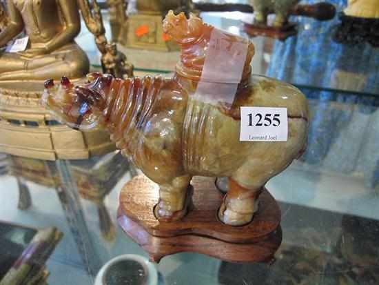 Appraisal: CHINESE CARVED STONE RHINOCEROS VASE ON STAND