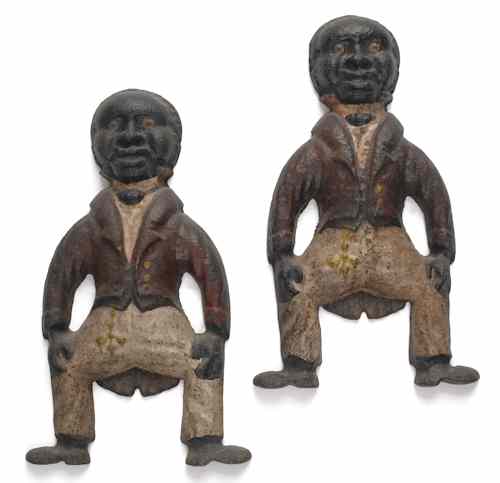 Appraisal: Pair of cast iron figural andirons late th early th