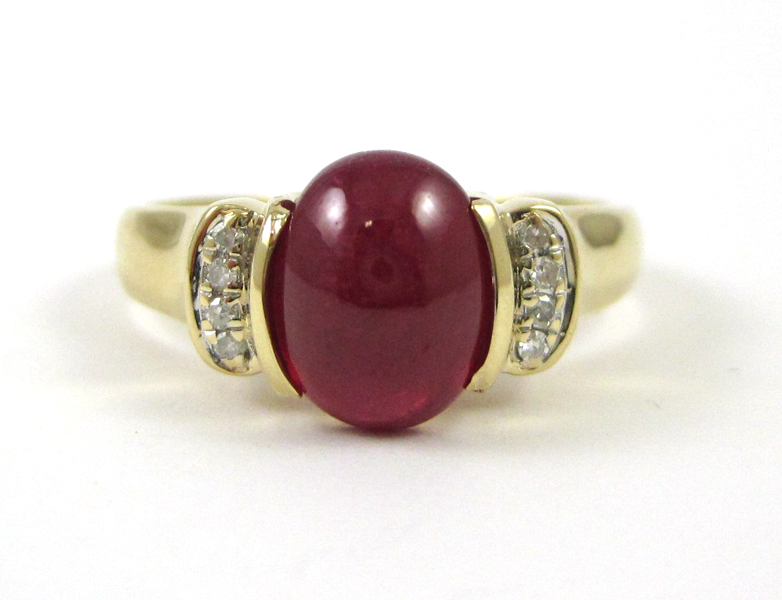 Appraisal: RUBY DIAMOND AND FOURTEEN KARAT GOLD RING with four round-cut