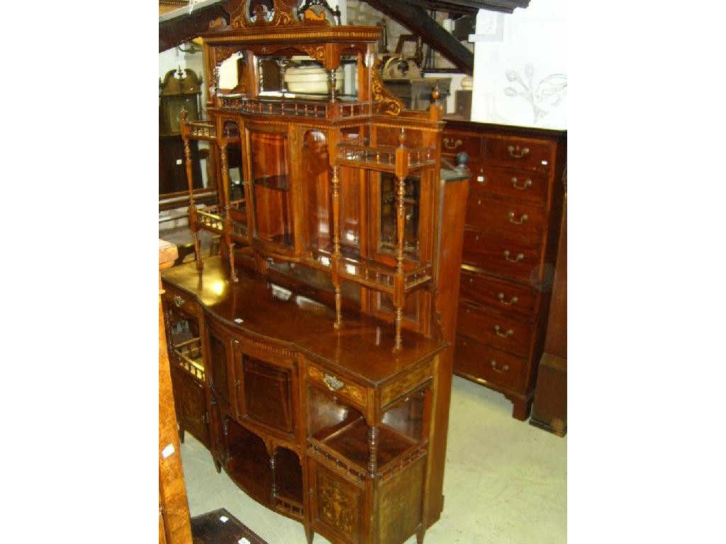 Appraisal: A good quality Edwardian rosewood chiffonier of full height the