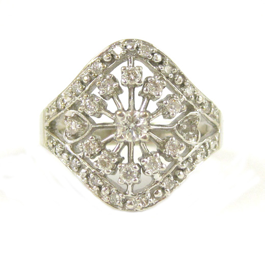 Appraisal: DIAMOND AND TEN KARAT WHITE GOLD RING set with round-cut