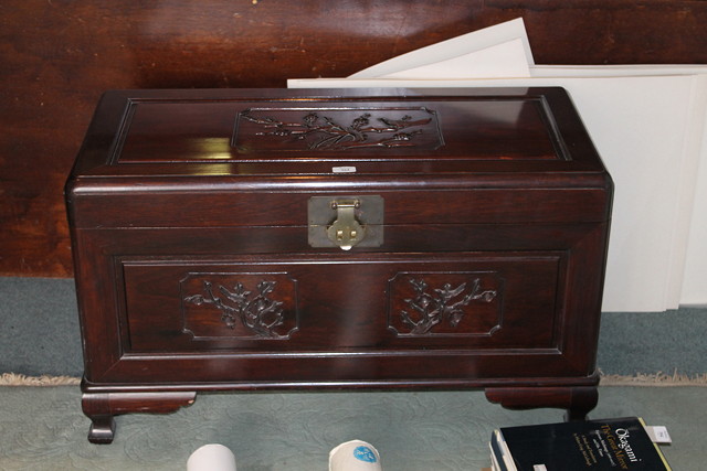 Appraisal: A CHINESE HARDWOOD AND CAMPHOR WOOD COFFER the lid and