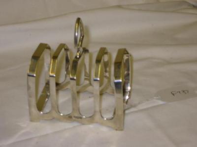 Appraisal: A TOAST RACK of oblong form with four divisions and