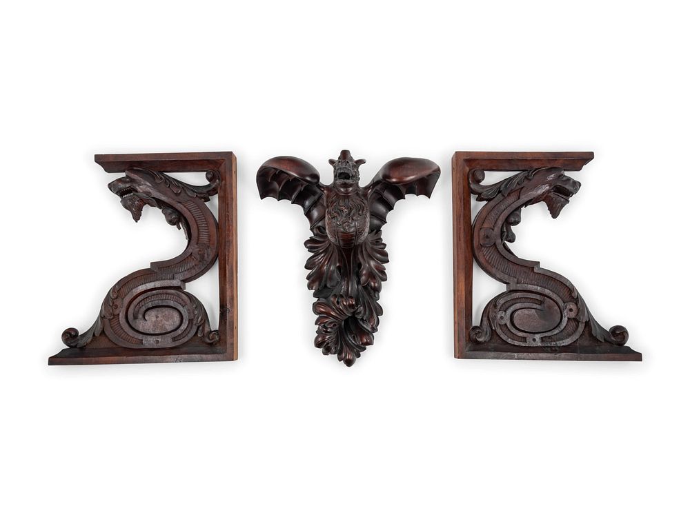 Appraisal: Three Continental Carved Walnut Griffin Form Brackets Three Continental Carved