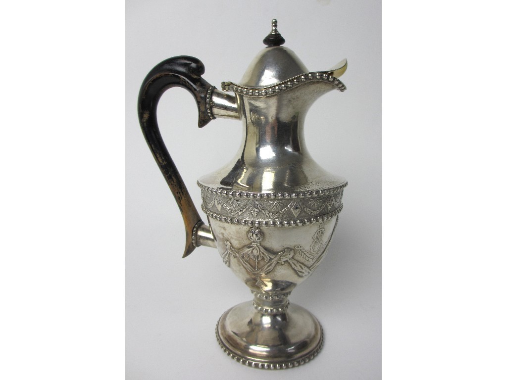 Appraisal: A Russian silver chocolate pot the waisted urn shaped body