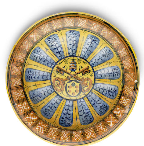 Appraisal: A Faenza or Siena maiolica dish with the arms of