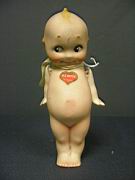 Appraisal: BISQUE KEWPIE Three piece bisque Germany Kewpie jointed arms Red