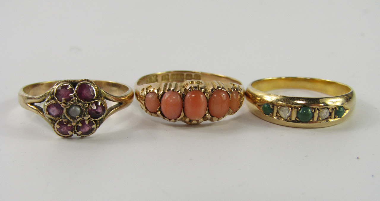 Appraisal: A ct gold and coral five stone ring size N