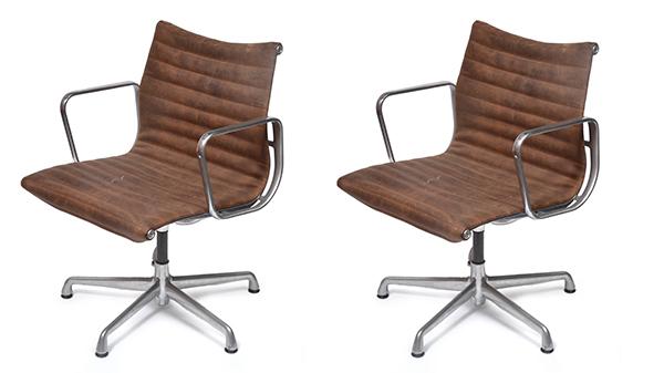 Appraisal: TWO EAMES ALUMINIUM SERIES OFFICE CHAIRS COVERED WITH BROWN LEATHER