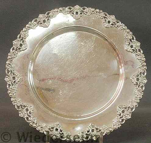 Appraisal: Round sterling silver tray with a chased shell and floral