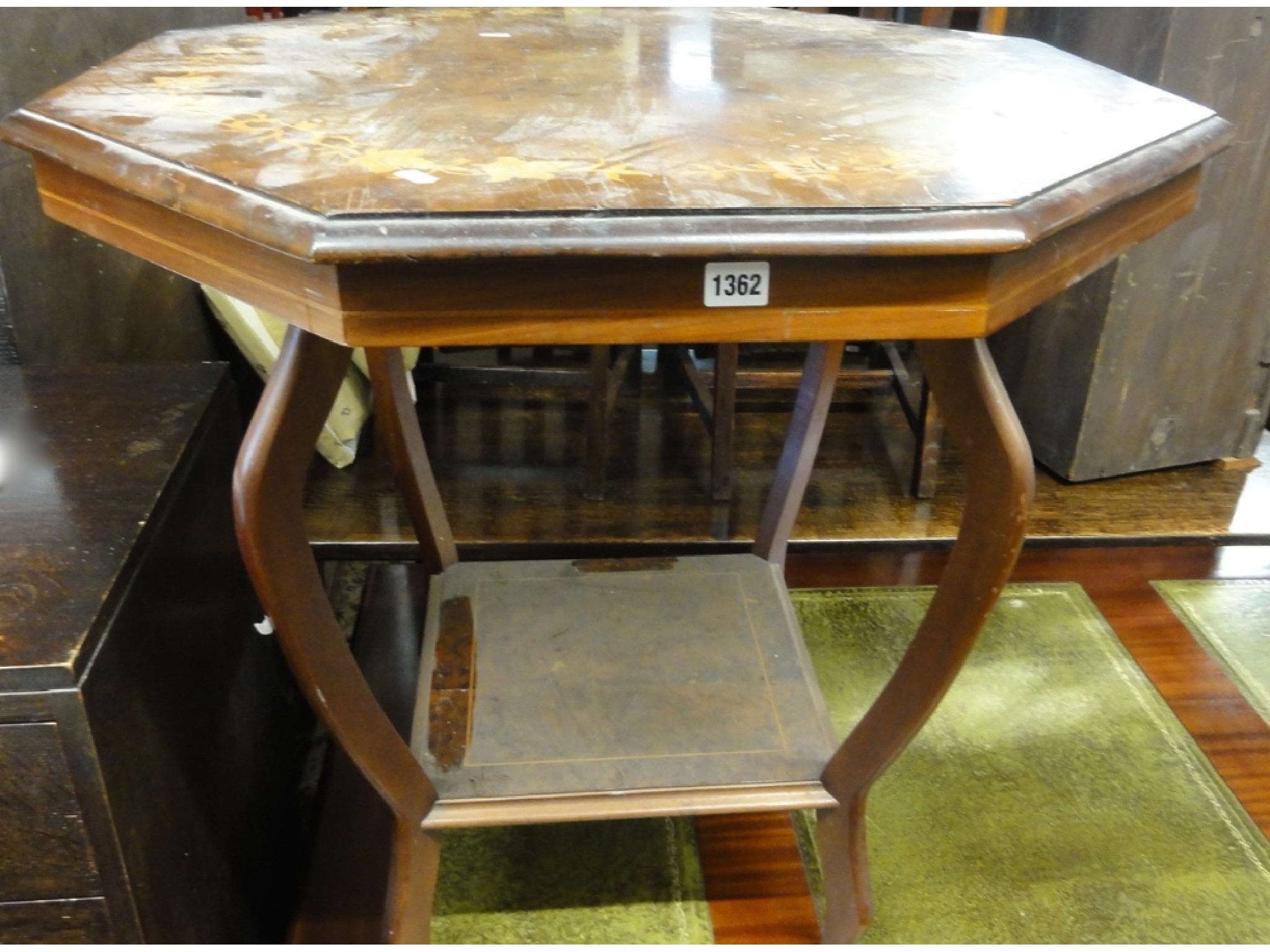 Appraisal: A Victorian walnut and figured walnut occasional table the octagonal