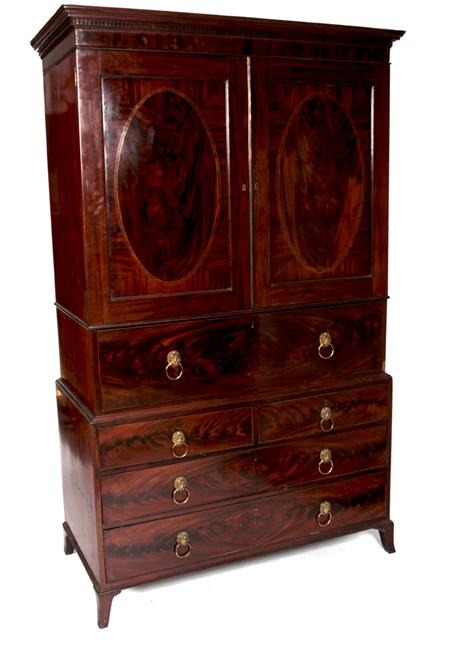 Appraisal: A Regency mahogany secretaire linen press the projected moulded dentil