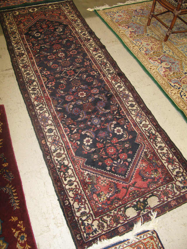 Appraisal: PERSIAN HAMADAN RUNNER Herati floral decoration on black ground hand