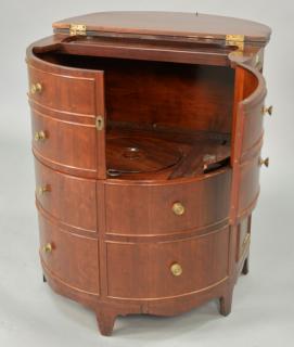 Appraisal: George III mahogany commode in demilune cabinet with opening top