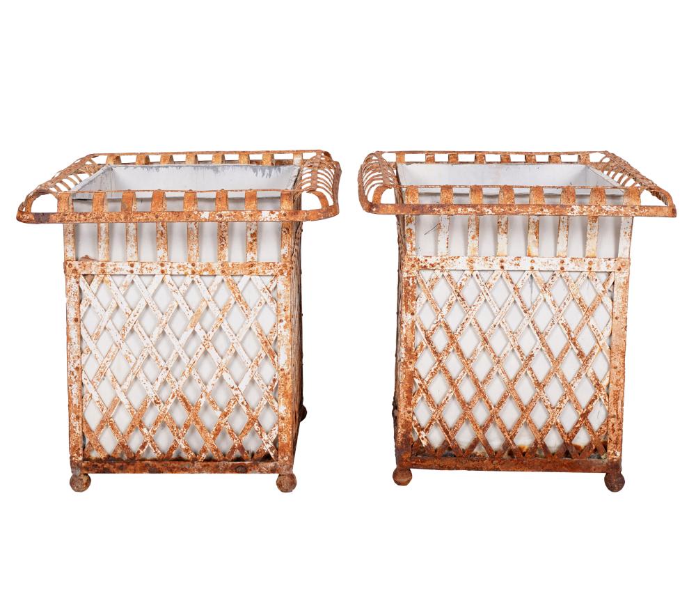 Appraisal: PAIR OF WHITE-PAINTED IRON LATTICED PLANTERSwith removable liners inches wide