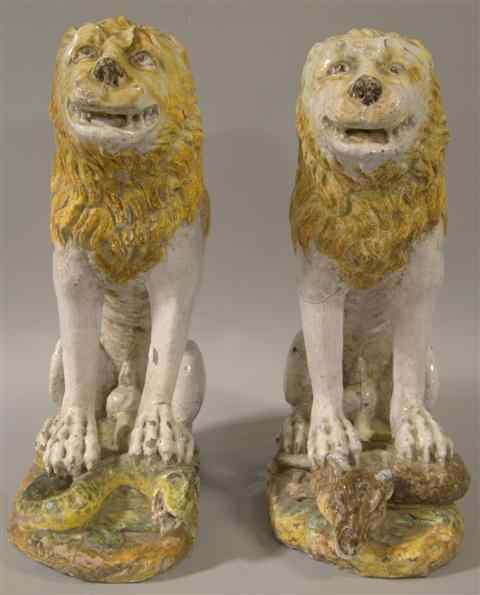 Appraisal: PAIR OF FRENCH FAIENCE LIONS th century both beasts seated