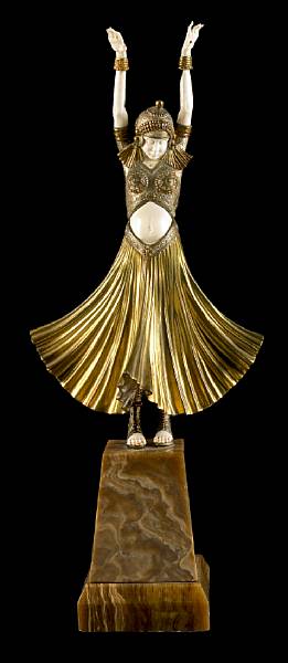 Appraisal: An Art Deco style bronze and ivory figure Hindu Dancer