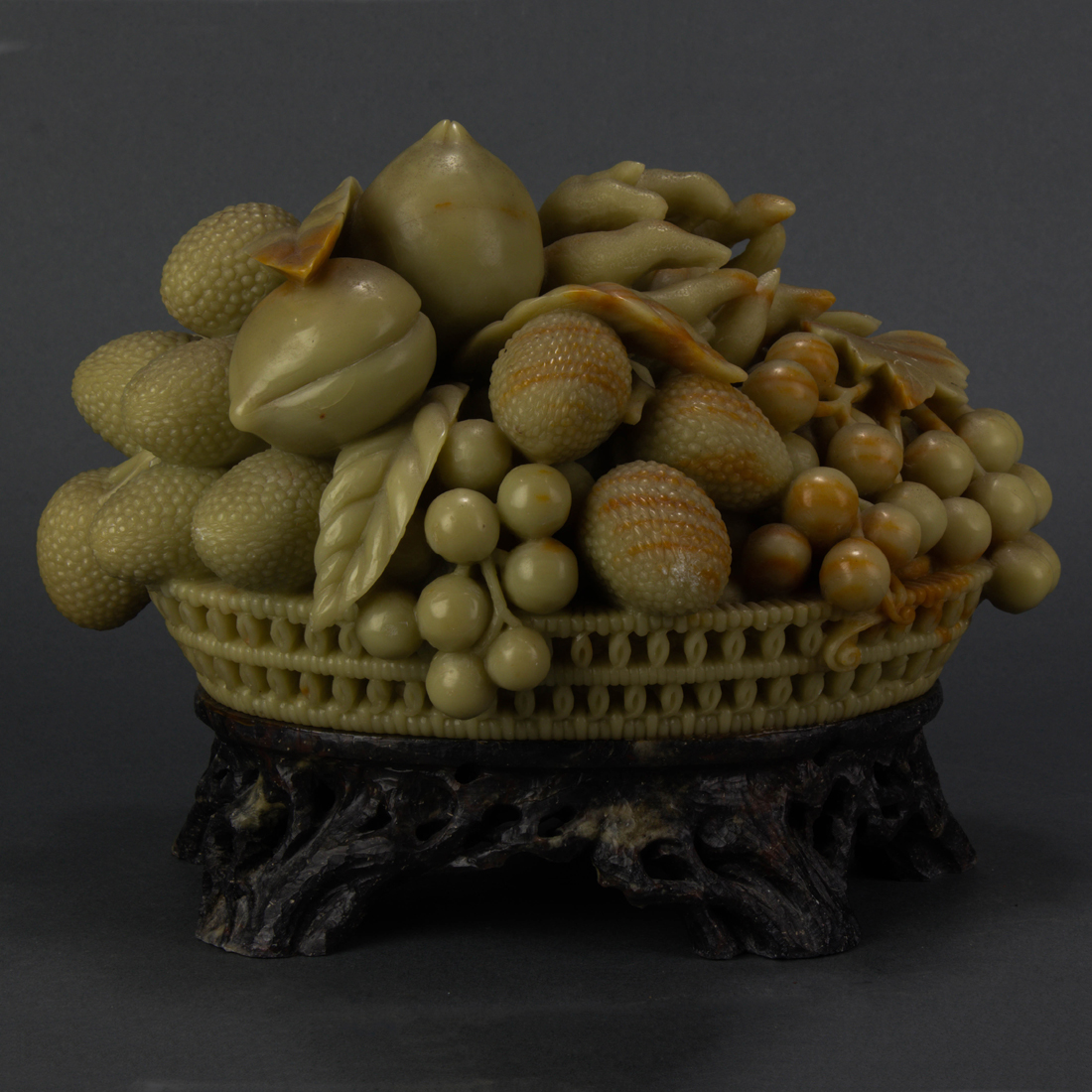 Appraisal: CHINESE SOAPSTONE CARVING Chinese soapstone carving depciting a fruit basket