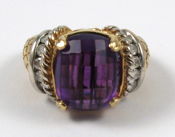 Appraisal: AMETHYST AND FOURTEEN KARAT GOLD RING centering a cushion shaped