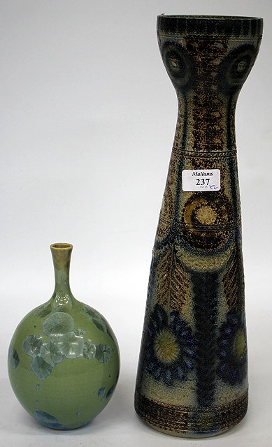 Appraisal: A STUDIO POTTERY OVOID VASE with narrow neck and with