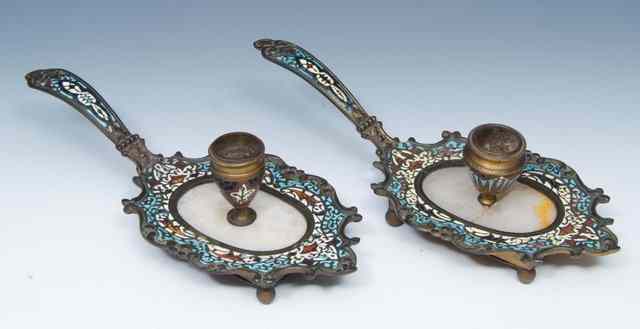 Appraisal: A PAIR OF TH CENTURY FRENCH CHAMPLEV CHAMBER CANDLESTICKS of