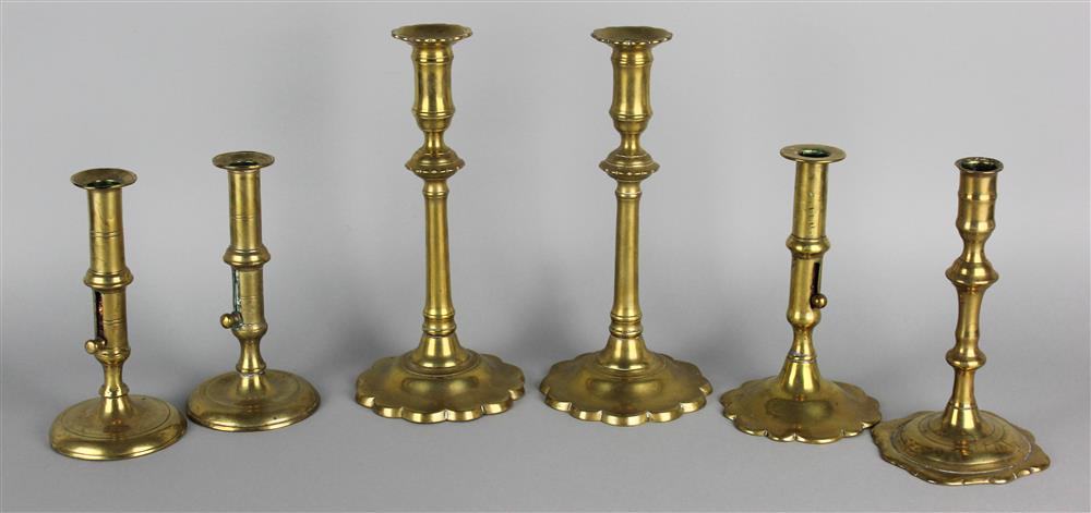 Appraisal: GROUP OF SIX ENGLISH BRASS CANDLESTICKS th Century including a