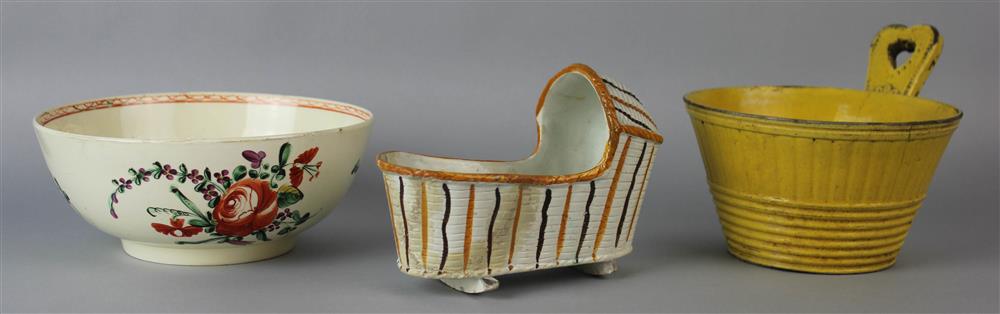 Appraisal: CREAMWARE BOWL PEARLWARE CRIB AND YELLOW-GLAZED BOWL late th and