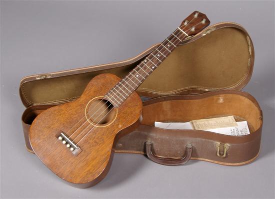 Appraisal: A Gibson Style Ukulele Length inches