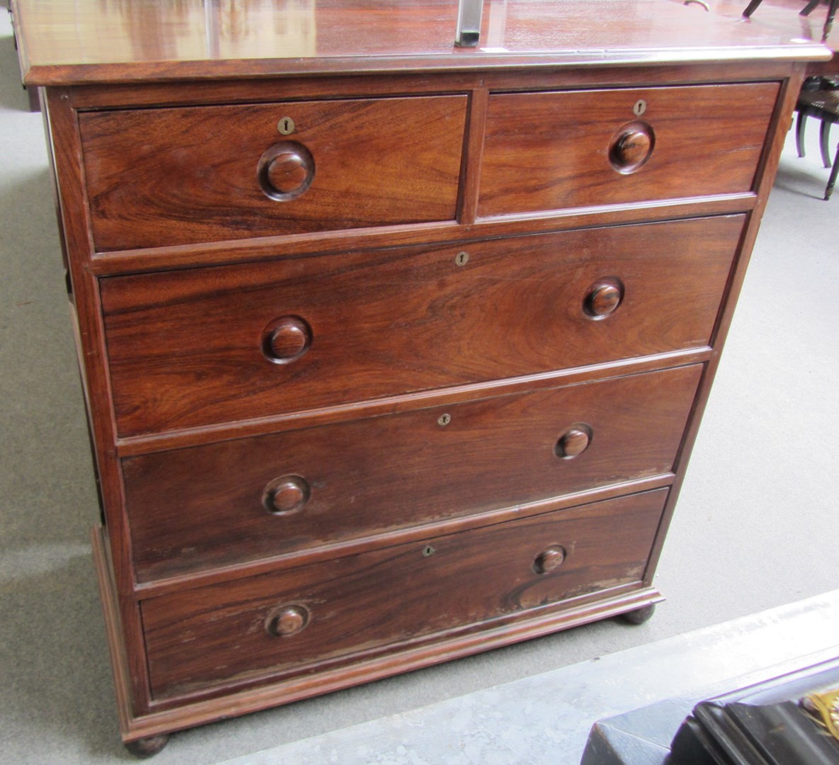 Appraisal: A th century teak chest of two short and three