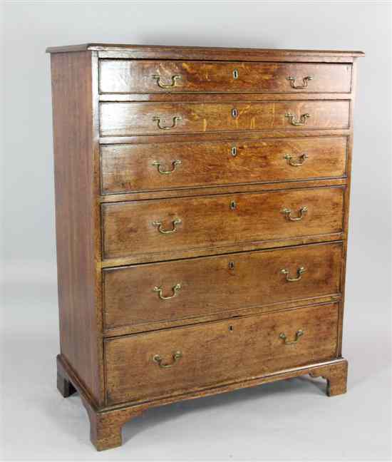 Appraisal: A George III oak chest of six graduated long drawers