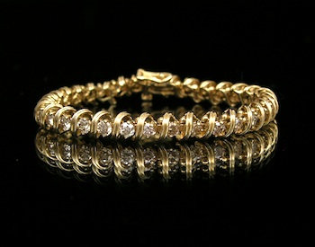 Appraisal: A Ladies' Seven Carat Diamond Tennis Bracelet k yellow gold